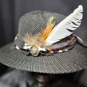 Black mesh decorated hat